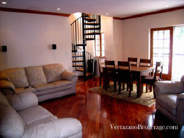 Granite Fire Place and Spirial Staircase